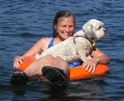 Artist, Nancy Nordstrand with her dog